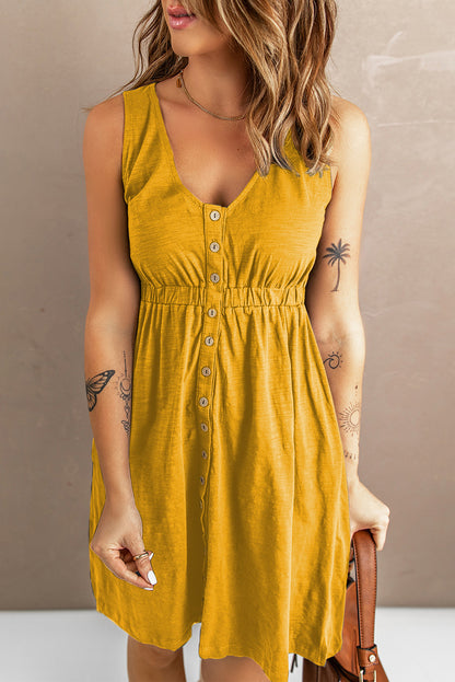 Chic mustard sleeveless dress with scoop neckline, front buttons, and a gathered waistline, perfect for summer fashion. Accessories not included.